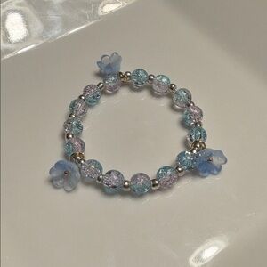 Elegant Blue, Purple, and Silver Beaded Bracelet with light blue flower charms